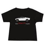 Tesla inspired apparel. Elon Musk quote. Cybertruck. Just Fix It In Post image centered on baby t-shirt.