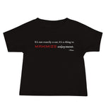 Tesla inspired apparel. Elon Musk quote. Maximize Enjoyment image centered on baby t-shirt.