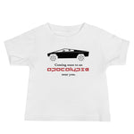 Tesla inspired apparel. Cybertruck. Apocalypse Near You image centered on baby t-shirt.