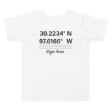 Tesla inspired apparel. Texas Gigafactory GPS coordinates. Birthplace Texas image centered on toddler t-shirt.