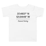 Tesla inspired apparel. Fremont Gigafactory GPS coordinates. Birthplace Fremont image centered on toddler t-shirt.