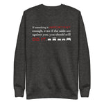 Tesla inspired apparel. Elon Musk quote. Against All Odds image centered on gray pullover.