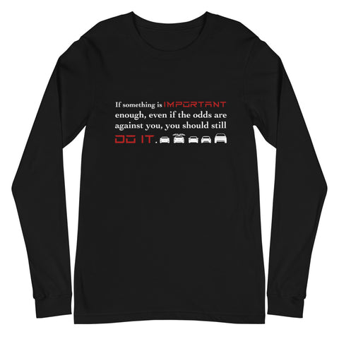 Tesla inspired apparel. Elon Musk quote. Against All Odds image centered on black long sleeve t-shirt.